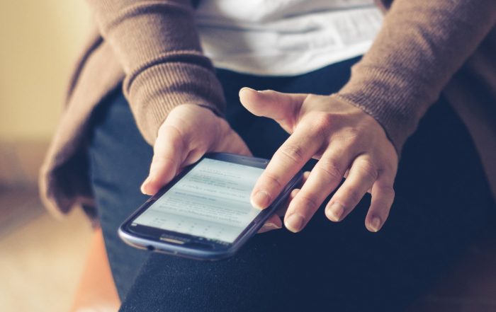 Woman Texting On Phone